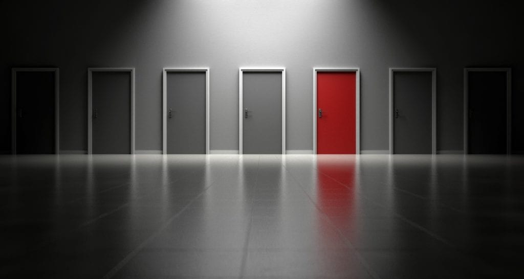 doors representing deciding between MBA program acceptances