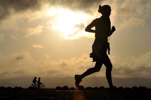 woman running to illustrate the idea of MBA competition